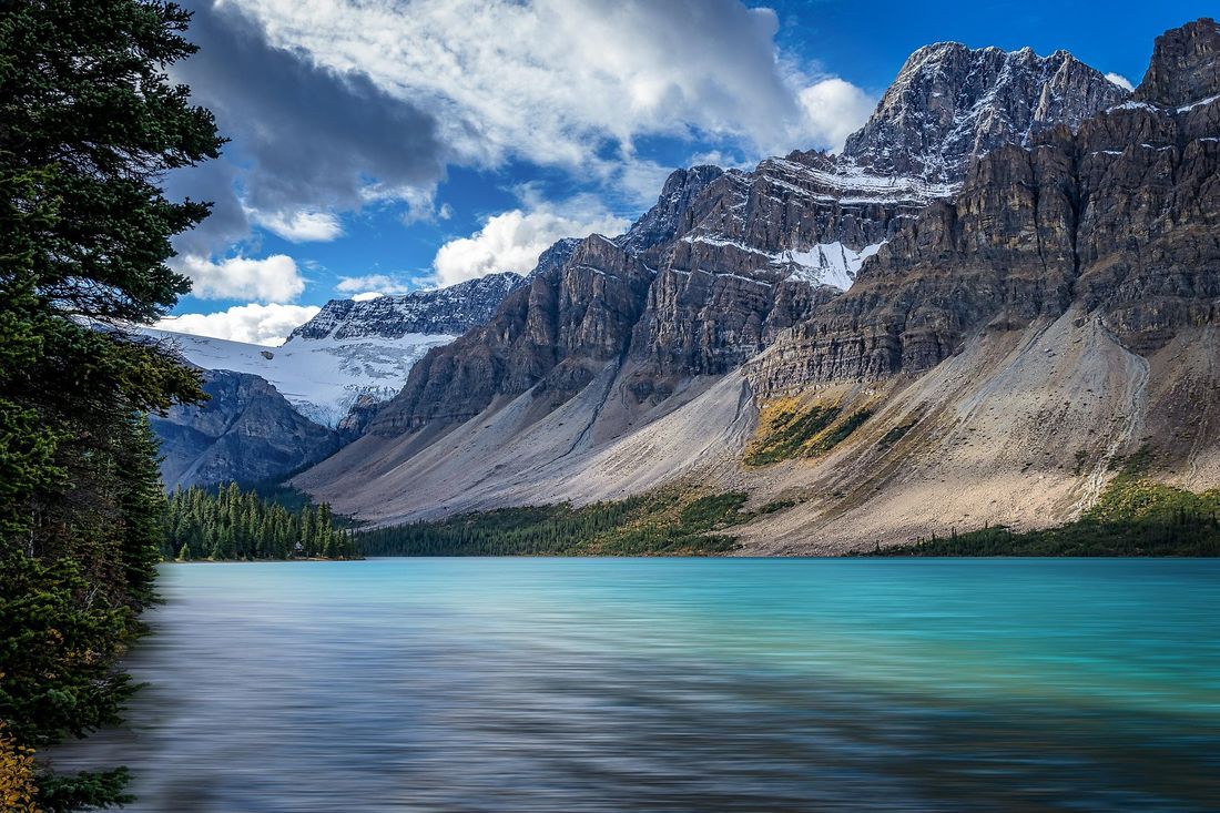 Turquoise mountain lake beneath rugged peaks